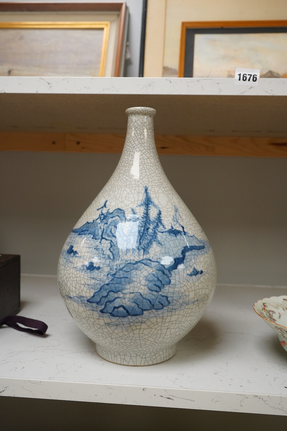 A Japanese blue and white crackle glaze bottle vase, 33cm. Condition - good